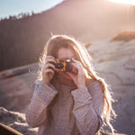 Load image into Gallery viewer, Yellow Disposable Camera in Mountains at Sunset