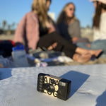 Load image into Gallery viewer, Tan Disposable Camera at Beach on Surfboard

